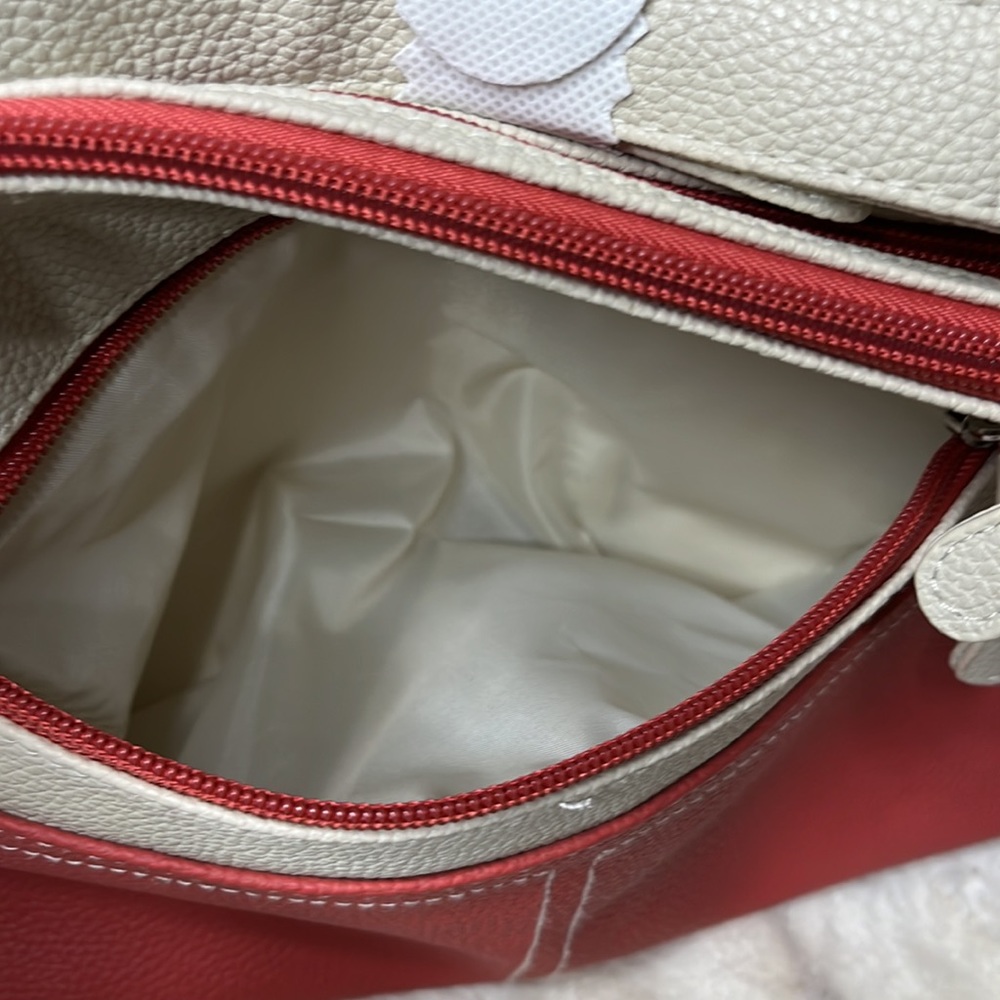 Stone & Co. two-toned crossbody. Double zipper top closure. Adjustable strap - Picture 8 of 15